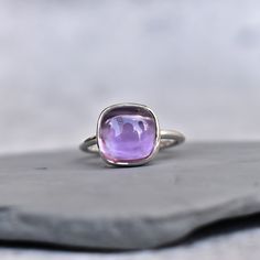 ✦ Gorgeous Natural Amethyst handmade sterling silver ring. A perfect Amethyst bohemian ring to become your statement jewelry or statement ring.  This purple quartz ring for women is also a great choice for engagement or alternative engagement ring And in case your want it to use as a proposal ring to make your first impression memorable your have all the good reason to go ahead with this. 💎  Please Note As with all Natural Gemstones The colors and inclusion patterns if applicable may vary sligh Luxury Silver Amethyst Ring With Natural Stones, Elegant Stackable Adjustable Amethyst Ring, Silver Stackable Amethyst Rings, Purple Hallmarked Amethyst Ring For Gift, Fine Jewelry Sterling Silver Solitaire Amethyst Ring, Amethyst Gemstone Stackable Rings For Wedding, Elegant Amethyst Stackable Rings As Gift, Purple Gemstone Stackable Rings In Sterling Silver, Elegant Sterling Silver Amethyst Ring With Bezel Setting