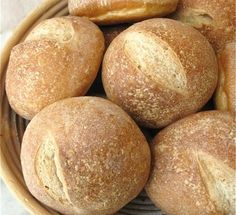 a basket filled with loaves of bread