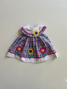 Sweet summer sundress! Tagged 12 months, seems accurate. Measures 14 inches long. Excellent condition. Retro Spring Playtime Dresses, Cute Lined Cotton Sundress, Vintage Summer Dresses For Playtime, Summer Vintage Dresses For Playtime, Vintage Dresses For Summer Playtime, Sunflower Applique, American Doll Clothes, Summer Sundress, Big Collar