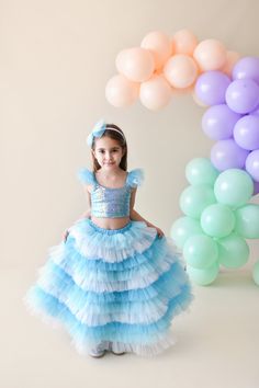 Our skirt, specially made for little princesses, has elasticated waist and lined inside. Their top blouses are lycra and crop cut. Hair accessories are not included. Outfit is suitable for frozen birthday party Fitted Light Blue Tutu Dress For Party, Blue Glitter Tulle Princess Dress, Fitted Princess Dress With Glitter Tulle Skirt, Fitted Princess Tutu Dress In Glitter Tulle, Fitted Princess Tutu Dress With Glitter Tulle, Fitted Tulle Skirt For Dress-up, Fitted Princess Dress With Tulle Skirt, Light Blue Fitted Tutu Dress For Pageant, Fitted Sequin Princess Dress