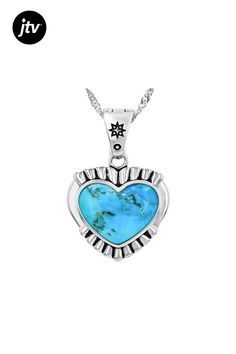 Indulge in the exquisite allure of our 16x12mm Blue Composite Turquoise Sterling Silver Heart Enhancer Pendant With Chain by Southwest Style by JTV���. Crafted with impeccable detail, this pendant boasts a captivating motif and vibrant turquoise hues that effortlessly elevate any ensemble. The composite turquoise features bound pieces intricately assembled to create a stunning visual effect.  Measuring at 1.16 inches in length and 0.82 inches in width, this accessory is designed to make a statem Blue Heart Beads Jewelry For Anniversary, Elegant Turquoise Heart-shaped Jewelry, Elegant Turquoise Jewelry With Heart Beads, Elegant Turquoise Heart Beads Jewelry, Elegant Turquoise Heart Cut Jewelry, Spiritual Blue Jewelry With Heart Charm, Turquoise Heart Pendant Necklace, Blue Spiritual Heart Pendant Jewelry, Spiritual Blue Heart Pendant Jewelry