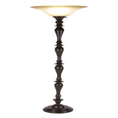 Bring light and sophistication to any corner of a room with this torchiere at 72 tall, this floor lamp will always grab attention. Its brown body features a series of curved designs and is topped with a tempered glass bowl that gives off a warm, gentle glow when the lamp is on. The on off knob sits just below the glass head. The torchiere best complements a traditional style room. Uses one standard A type light bulb (not included). Cord length measures 72". Suitable for indoor use only. Easy on and off twist switch located next to glass shade. This item comes shipped in one carton. Traditional style.16"Lx16"Wx71.5" | Brown Tempered Glass Torchiere Floor Lamp by Quinn Living in Brown Corner Of A Room, Huge Lamp, Glass Head, Tall Floor Lamps, Stone Lamp, Torchiere Lamp, Traditional Lamps, Luxury Lamps, Tall Lamps