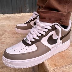 Hand painted taupe/brown colorway on all white Air Force 1. Painted with water resistant and non cracking leather paint. Nike Airforce Brown, Brown Fade-resistant Sneakers With Round Toe, Brown Custom Lace-up Sneakers With Speckled Midsole, Brown Low-top Custom Sneakers For Outdoor, Sporty Custom Brown Sneakers With Speckled Midsole, High-top Leather Sneakers, Waterproof High-top Leather Sneakers, White Leather Custom Sneakers For Outdoor, Custom White Leather Sneakers For Outdoor