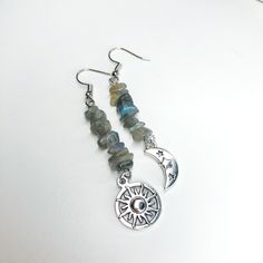 Labradorite Crystal Celestial Drop Earrings/Silver Sun and Moon Drop Earrings/Hippie Earrings/Moon Hippy Earrings/Hippie Jewelry/Boho Gift - Silver Plated Crystal Earrings - Crystal: Labradorite  - Charm Material: Silver plated brass  - Closure: Hook or Huggie Check other styles in my shop: https://www.etsy.com/listing/1457441539/prehnite-crystal-green-sun-silver-drop?click_key=2c98c4d7ef1c600e346e0d454bddbe96c2be70dd%3A1457441539&click_sum=bfd25b43&ref=shop_home_feat_1&pro=1 https://www.etsy.co Bohemian Moon Phase Earrings For Festivals, Bohemian Moon Phase Dangle Earrings, Adjustable Bohemian Moon Earrings, Bohemian Sterling Silver Moon Phase Earrings, Bohemian Earrings With Sun And Moon Design, Bohemian Moon Phase Earrings, Nickel Free Silver Labradorite Earrings, Bohemian Round Earrings With Sun And Moon Design, Bohemian Sun And Moon Design Earrings For Gift