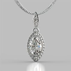 Any day is the perfect time to give that special someone a little something extra with this vibrant pendant.An elegant beaded milgrain and a stunning halo surround a Marquise Cut simulated diamond inset in a gorgeous setting with cut out detailing on the sides. The pendant features a bail slide that always sits flush on your dcollet. Sure to impress! Marquise Cut Drop Style With Embelished Bail Pendant;  Center Stone: 1 CT;  Total Carat Weight: 1.44 CTW;  Stone Clarity: VVS-1;  Available in:925 Halo Pendant, Man Made Diamonds, Marquise Cut Diamond, 925 Sterling Silver Chain, Silver Gifts, Marquise Cut, Fashion Jewelry Necklaces, Sparkle Diamonds, Real Diamonds