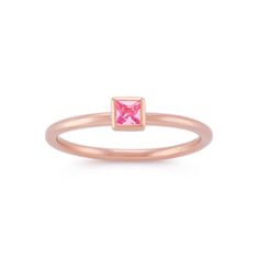 Any way you stack it  this ring is adorably sweet and charming. One princess cut pink natural sapphire  at approximately .16 carat  is a bezel-set in the center of this design adding a bright color accent. This ring is crafted of quality 14 karat rose gold and is fashionable to wear alone or stacked with multiples of your favorite stackable styles. Pink Bezel Set Stackable Rings For Anniversary, Pink Sapphire Stackable Ring In Fine Jewelry Style, Fine Jewelry Pink Ring With Bezel Setting, 14k Gold Pink Sapphire Ring With Bezel Setting, Pink Sapphire Stackable Ring Gift, Pink Sapphire Ring In 14k Gold With Bezel Setting, Pink Sapphire Ring With Bezel Setting In 14k Gold, Pink Stackable Sapphire Ring Gift, Pink 14k Gold Stackable Rings