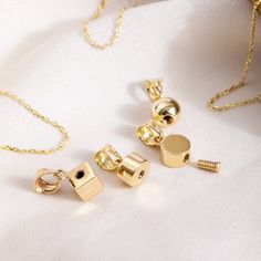 14K Yellow Gold Tiny Fillable Personalized Memorial Pendant, Cremation Jewelry for Pet or Human Ashes, Minimalist Mini Ball, Cylinder, Cube, Round Disc Medallion Cremation Urn Necklace for Loss of loved ones. SOLD AS A PENDANT You may check our chain models via the link below https://etsy.me/3EUig8k REMINDER These products are very minimal products and only a very small amount of ashes can be placed in them. Material: Real Solid Gold, real gold (not gold-filled or not gold-plated) Available Gold Cremation Necklaces, Mama Necklace, Memorial Pendant, Urn Necklace, Urn Necklaces, Human Ashes, Cremation Jewelry, Disc Pendant, Zodiac Necklaces