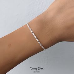 Product Details + Care - 14k White Gold Plated - 1 Bracelet - Wipe Clean 6.9” Length Made In Italy Photos Pretty Bird Usa Llc 2023 Ig @Prettybird_usa Www.Prettybirdjewelry.Com Classic White Chain Bracelet For Everyday, Minimalist White Figaro Chain Jewelry, Classic White Link Bracelets, Formal Silver Paperclip Bracelet, Tarnish Resistant, Silver Tarnish Resistant Paperclip Bracelet For Formal Occasions, Formal Silver Paperclip Bracelet Tarnish Resistant, Elegant Sterling Silver Bracelet With Figaro Chain, Gift White Chain Bracelet With Solid Link Construction, White Chain Bracelet With Solid Links As Gift