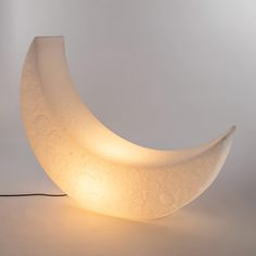 a lamp that is shaped like the moon