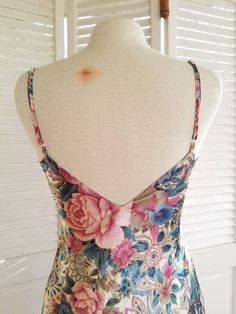 "Vintage paisley babydoll lingerie. Made by Victoria's Secret. Gold Label. Adjustable spaghetti straps. Lace neckline. Rich colors. Floral and paisley design. Cuts higher at the sides. Body: 100% polyester. Lace: 100% nylon. (measurements taken flat) Label size: P Bust: 17\" Waist: 18.5\" Hips: 20.5\" Length: 26.5\" (not including straps) Excellent vintage condition. No rips, holes, or stains. Cleaned and ready to wear." Fitted Floral Print Camisole For Loungewear, Fitted Camisole For Pajama Party, Paisley Slip Dress, Fitted Floral Print Camisole, Babydoll Nighty Vintage, Vintage Lace Trim Slip Dress For Night, Vintage V-neck Sleepwear, Vintage V-neck Lace Trim Slip Dress, Vintage Paisley