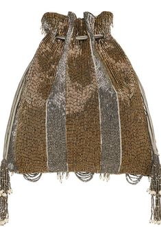 This lustrous drawstring pouch can be styled as a sling bag and a potli. It is sumptuously hand embroidered with luminous Japanese micro beads & baroque pearls in a pave’ application. Ornamental scallop tassels & wisply baroque fringes adorn the front while nonchalant stripes dress the reverse side of this pouch. Elegant Silver Bucket Bag For Party, Glamorous Evening Bucket Bag, Embellished Clutch Potli Bag, Elegant Silver Bucket Bag With Dust Bag, Elegant Silver Bucket Bag, Luxury Silver Bucket Bag For Party, Hand Embellished Potli Pouch Bag For Evening, Festive Embellished Pouch Shoulder Bag, Hand Embellished Potli Bag For Festive Occasions