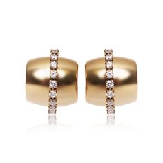 Our beautiful Serena Earrings feature a cuff hoop silhouette with a brightly polished finish, studded with sparkling round brilliant cut stones in the middle for total glamor. These little hoops sit close to the earlobes, making them the perfect finishing touch to your look, day or night. Metal Type: Stainless Steel Metal Plating: 18K Gold PlatedStone: Cubic ZirconLength: 0.78" Elegant Hoop Clip-on Earrings For Formal Occasions, Elegant Hoop Clip-on Earrings For Formal Events, Elegant Formal Clip-on Hoop Earrings, Yellow Gold Hoop Earrings With Diamond Accents For Evening, Evening Yellow Gold Hoop Earrings With Diamond Accents, Elegant Huggie Clip-on Earrings, Gold Diamond Hoop Earrings For Evening, Elegant Hoop Clip-on Earrings For Anniversary, Modern Gold Earrings With Sparkling Stones