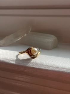 Vintage 14K Gold Diamond Pearl Ring - Etsy Retro Yellow Gold Rings Stamped 14k, Antique Gold Pearl Ring In 14k Gold, Classic 14k Gold Bypass Ring With Polished Finish, Heirloom Style Gold Pearl Ring With Polished Finish, Vintage Yellow Gold Dome Ring With Polished Finish, Vintage 14k Gold Pearl Wedding Ring, Vintage 14k Yellow Gold Cluster Ring, Mid-century Polished Finish Jewelry For Anniversary, Vintage White Pearl Ring Stamped 14k