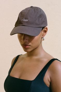 In a vintage-inspired Cocoa brown cotton, the L'Oasis Souvenir Cap offers a classic cap shape and features an adjustable back strap for ease of fit. An understated L'Oasis logo is delicately embroidered at the front, and Faithfull at the back. Designed to be a sunshine essential, the Souvenir Cap is an effortless addition to any off-duty or vacation look. Brown Dad Hat For Everyday Wear, Brown Dad Hat For Everyday Use, Brown Dad Hat, One Size, Everyday, Brown Cotton Hat With Curved Visor, Brown Snapback Dad Hat For Everyday, Vintage Everyday Baseball Cap With Curved Bill, Vintage Brown Visor Baseball Cap, Vintage Curved Visor Summer Hat, Everyday Brown Baseball Cap With Curved Bill