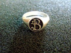 Beautiful personalised Monogram Signet Ring. It is made completely out of Sterling Silver (aka Silver 925 each piece is stamped)... Luxury Hallmarked Sterling Silver Signet Ring, Luxury Silver Ceremonial Signet Ring, Silver Engraved Initials Ring, Silver Engraved Ring With Initials, Silver Signet Ring With Initials For Promise, Silver Engraved Ring With Initials For Promise, Silver Engraved Promise Ring With Initials, Silver Initial Ring With Engraving For Promise, Silver Personalized Initial Ring With Round Band