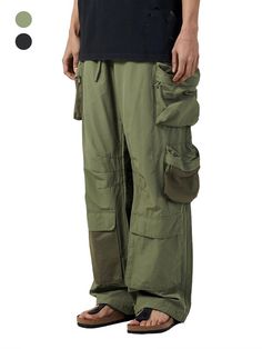 It is a casual modified cargo pant with mesh fabric point. The pant is made of cotton and nylon blend fabric, which make silky touch and lightweight and comfy fit.- Elastic band on the back waist- Side pockets- Back pockets- Mesh pockets- Bar tacks on pockets Baggy Military Pants With Cargo Pockets, Green Utility Pants With Cargo Pockets, Combat Style Relaxed Fit Bottoms With Side Pockets, Combat Style Long Pants With Side Pockets, Combat Style Bottoms With Side Pockets And Relaxed Fit, Combat Bottoms With Side Pockets Relaxed Fit, Relaxed Fit Combat Bottoms With Side Pockets, Green Baggy Cargo Jeans With Hip Pockets, Combat Style Pants With Multiple Pockets