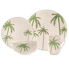 the palm tree dinnerware is green and white