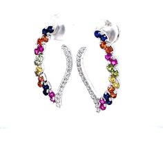 These stunning earrings have a combination of Diamonds and Sapphires sparkling around each other. There are Round Cut Diamonds that weigh 0.42 Carats (Clarity: SI2, Color: F), Multi Color Sapphires that weigh 1.18 Carats and Orange Garnets that weigh 0.42 Carats. The total carat weight of the earrings is 2.00 Carats. The length of the earrings is approximately 1.5 inches and come with a push back post designed for an easy and secure wear. They are beautifully set in 14 Karat White Gold and weigh White Gold Earrings, Stunning Earrings, Round Cut Diamond, Free Jewelry, Rings Statement, Shop Necklaces, Round Cut, Ring Earrings, Necklaces Bracelets