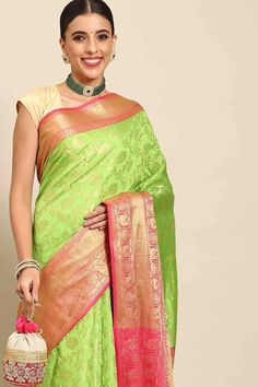 Product Features: Saree: Saree as seen in picture - Choose the drape style while order: Standard, Pleated or Gujarati Saree Color: Parrot Green Saree Fabric: Art Silk Saree Style: Handloom Saree Saree Work: Woven Design Saree Pattern: Regal Weave Saree Print: zari Blouse: Blouse design must be chosen while ordering. For the blouse in pic, please choose the selection "As seen in picture" or customize your selection. Blouse Color: Parrot Green Blouse Fabric: Art Silk Wash Care: Dry Clean Only Occa Green Pre-draped Saree With Meenakari For Puja, Pre-draped Saree For Puja Festivals, Festive Pista Green Banarasi Silk Pre-draped Saree, Festivals Brocade Pre-draped Saree With Pallu, Designer Wear Pista Green Saree, Pista Green Blouse Piece For Transitional Season, Paithani Silk Pre-draped Saree With Pallu, Zari Weaving Lehenga For Puja, Pre-draped Saree For Festivals With Self Design