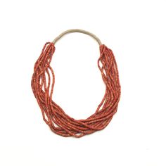 "Bohemian natural red coral multistrand beaded necklace with hemp. About 1.75\" wide and 30\" in length." Unique Multi-strand Hand-strung Beads, Orange Hand-strung Multi-strand Jewelry, Orange Multi-strand Hand-strung Jewelry, Red Fair Trade Jewelry With Round Beads, Red Artisan Handwoven Jewelry, Orange Multi-strand Jewelry For The Beach, Orange Multi-strand Jewelry For Beach, Red Hand-strung Multi-strand Jewelry, Red Handwoven Beads For Jewelry Making