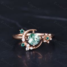 5mm Dainty Round Cut Moss Agate Moon Ring Solid Rose Gold Unique Emerald Star Engagement Ring Art Deco Green Stone Bridal Ring Promise Ring Side stones: emeralds and Moissanite This ring can also be made in genuine solid 10k, 14k, 18k gold or Platinum, and all the rings in my shop can be customized too! If you want to know more details about the ring, just contact with me anytime! If you want to customize the ring, just contact with me anytime! If you want to make a custom jewelry, just contact with me anytime! PROCESS TIME AND SHIPPING It usually takes about 3-4 weeks to finish the ring and 4-6 days to deliver to you if you are in US. (Free Shipping within US!) We will offer you the tracking number once your ring is shipped. WARRANTY 30 days money back guarantee! If you have any questions Green Moon Ring, Celestial Crescent Gemstone Rings, Green Celestial Round Jewelry, Celestial Rose Gold Gemstone Rings, Celestial Style Rose Gold Round Rings, Celestial Style Round Rings For Jewelry Making, Star Engagement Ring, Agate Wedding Ring, Agate Wedding