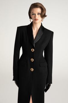 Invest in a coat that embodies luxury and sophistication with the Evie Long Suit Jacket. This stunning coat is made of buttery soft fabric that keeps you warm while looking chic. The silk lapels and gold buckles tie the entire design together to give you a look straight out of London. Long-line suit jacket Lapel design Gold buckles Functional pockets Dry clean only Long Suit Design, Extreme Confidence, Long Suit Jacket, Long Suit, Lapel Design, Structured Blazer, Mode Abaya, Black Polo, Long Sleeves Coats