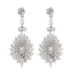 Stunning vintage chandelier high jewelry earrings. Approximately 15.75 carats of pear, marquise and round brilliant diamonds. Approximately H/I color grade and VS2/SI1 clarity grade. 18-karat white gold, 18.02 grams.  Accommodated with an up-to-date digital appraisal by a GIA G.G. once purchased, upon request. Please contact us with any questions. Luxury Elegant Clip-on Earrings With Brilliant Cut, Marquise Shape Diamond Earrings, High Jewelry Earrings, Red Chandelier, Shell Chandelier, Diamond Chandelier Earrings, Diamond Chandelier, Silver Chandelier Earrings, Gold Chandelier Earrings