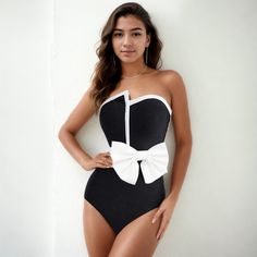 Monochrome Glam Bow One-Piece Swimsuit-One Piece-StylinArts Beachwear Swimwear With Bow For Poolside, Bow Detail Beachwear Swimwear For Poolside, Summer Vacation Swimwear With Bow, Fitted Swimwear With Bow For Swimming, Chic One-piece Party Swimwear, Chic One-piece Swimwear For Party, Chic Black One-piece Swimwear, Elegant Black Bodysuit For Pool, Elegant Black Bodysuit For Beach Season