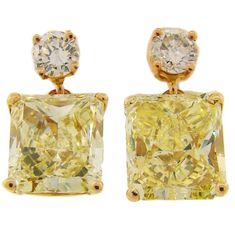 Classic and timeless two-stone earrings that are a great addition to your jewelry collection. They are made of 18 karat (tested) rose gold and feature two rectangular modified brilliant cut fancy yellow diamonds. Each diamond comes with a GIA Colored Diamond Grading Report (please see pictures 9 and 10). One diamond weighs 3.21 carats and another one 3.04 carats. Top diamonds are round brilliant cut and weigh 0.25-carat each. Diamond total weight is 6.75 carats. The earrings are 5/8 inch (1.5 cm) long and 5/16 inch (0.8 cm) wide. They weigh 4.8 grams. Luxury Yellow Gold Diamond Earrings For Evening, Luxury Yellow Diamond Cut Earrings, Formal Yellow Diamond Earrings With Diamond Cut, Yellow Diamond Earrings For Formal Occasions, Formal Yellow Diamond Cut Earrings, Formal Yellow Diamond Earrings, Luxury Gia Certified Yellow Gold Diamond Earrings, Luxury Yellow Diamond Drop Earrings, Elegant Yellow Diamond Earrings