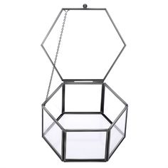 an octagonal glass box hanging from a chain