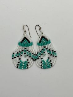 "Handmade beaded drop earrings. Measure 2.5\" long including hook and just over an inch wide. Turquoise, black and white Miyuki glass beads used.  Please feel free to contact me with any questions." Klamath Falls, Beaded Earrings Tutorials, Earrings Turquoise, Earrings Beaded, Beaded Drop Earrings, Earring Tutorial, Beaded Bracelets Diy, Brick Stitch, Jewelry Handmade