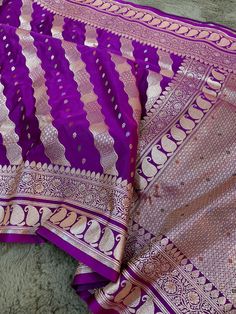 This is a very beautiful high quality mashru silk saree . All over zari motifs design with border . Saree length - 5.5 mtr. Blouse - 1 mtr. Dry clean only . Please note - color may be vary a little due to sunlight and photography . Please message us after purchasing in case you want fall and Pico done it not . No extra charges for fall and Pico but inform us . Blouse stitching is also available . Semi-stitched Purple Banarasi Silk Saree, Purple Silk Handloom Pre-draped Saree, Festive Purple Tussar Silk Pre-draped Saree, Purple Semi-stitched Cotton Silk Pre-draped Saree, Purple Handloom Katan Silk Pre-draped Saree, Indian Silk Sarees, Motif Design, Wedding Wear, Saree Wedding