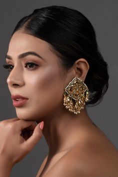 Super versatile kundan embellished earrings, one of our absolute bestsellers! composition : Metal copper alloy work : kundan with meenkari on back side  Measurement  Length - Length - 3in, Width - 1.7in closure- push back Care Instruction  Spot-Cleaning only. Store in a  pouch& box. Keep away from fragrance and water. Festive Chandbalis With Gota Work For Reception, Festive Gota Work Chandbalis For Reception, Festive Chandbalis With Meenakari For Reception, Fusion Kundan Bridal Earrings With Cutdana, Fusion Style Kundan Chandelier Earrings With Latkans, Fusion Kundan Jhumkas With Gota Work, Fusion Style Kundan Jhumkas With Gota Work, Fusion Kundan Chandelier Earrings With Latkans, Kundan Danglers With Stone Work For Reception