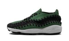 The Women’s Nike Air Footscape Woven “Fir” is a women’s-exclusive colorway of the sneaker that combines elements from the Nike Air Footscape and Nike Air Woven with green details.  The Air Footscape Woven is an attention-grabbing shoe, as it features a unique asymmetrical lacing system.  The upper has a Fir, or green-colored suede construction with a black woven laces to match the weave found throughout the shoe.  Classic “Nike” branding appears on the tongue.  Underfoot, a white midsole and bla Nike Brand, Japan Design, Green Suede, Cow Print, Black Rubber, Sale Items, Nike Shoes, Nike Women, Athletic Shoes