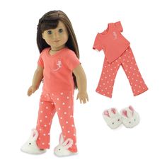 an american girl doll wearing pink pajamas and shoes with white polka dots on the leggings