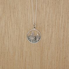 Recycled Sterling Silver Adventure Necklaces are the best way to remind ourselves where our happy place is. Beautifully handcrafted pendants can be worn alone or layered with other necklaces. Choose from: Dog Howling, Trees, Star Compass, Sky, Mountains, Waves. This pendant comes on a 18" Sterling silver chain. 18" Sterling Silver Cable Chain from US, Lead and Nickel Free. Recycled Sterling Silver Adventure Pendants made in Thailand Shipped from our studio in Oregon Bohemian Personalized Necklaces For Everyday, Everyday Personalized Bohemian Necklaces, Everyday Bohemian Personalized Necklaces, Personalized Nature-inspired Sterling Silver Necklaces, Personalized Sterling Silver Nature-inspired Necklaces, Spiritual Hand Stamped Pendant Necklace, Nature-inspired Sterling Silver Pendant Charm Necklace, Nature-inspired Silver Hand Stamped Jewelry, Sterling Silver Everyday Necklace With Nature-inspired Style