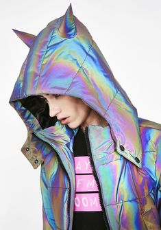 will have ya goin' from chic to freak! You light up when the sun goes down in this insta-worthy bomber jacket that has an oil slick rainbow reflective construction, pockets on the sides, a front zip closure, and a detachable hood with horns. Trendy Metallic Outerwear For Streetwear, Trendy Rainbow Outerwear For Fall, Trendy Iridescent Outerwear For Fall, Trendy Iridescent Long Sleeve Outerwear, Trendy Rainbow Long Sleeve Outerwear, Trendy Rainbow Outerwear For Spring, Looks Neon, Festival Outfit Women, Mood Night