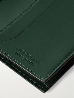 Montblanc launched its 'Meisterstück' collection over 100 years ago with a line of pens, today, it encompasses sleek leather accessories like this bifold cardholder. Hand-treated for a rich dégradé effect, it's been made in Italy and features three slots as well as two pockets to tuck folded bills and receipts. Green Luxury Card Holder With Interior Slots, Elegant Green Bifold Card Holder, Elegant Green Formal Card Holder, Green Leather Luxury Card Holder, Luxury Green Leather Card Holder, Modern Green Wallet For Business, Green Bifold Wallet For Formal Occasions, Green Leather Card Holder For Formal Use, Leather Billfold