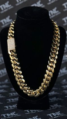 PRODUCT IS BACK IN STOCK AND READY TO SHIP - GRAB YOURS NOW BEFORE THEY'RE GONE AGAIN! 🚀🔥 ⛓ The Chain: Introducing our stunning 20mm Cuban Link Chain with a dazzling diamond clasp! Measuring 24 inches in length, this exquisite piece of jewelry is the perfect addition to any fashion-conscious individual's collection. Crafted with precision and care, this chain boasts a bold 20mm width that exudes strength and confidence. The links are made with a high-quality metal that is both durable and long-lasting, ensuring that this chain will withstand the test of time and remain a treasured possession for years to come. The highlight of this Cuban Link Chain is its striking diamond clasp, which adds a touch of luxury and sophistication to an already impressive piece. This clasp is adorned with shi Silver Cuban Link Necklace With Bling, Diamond Cuban Link Necklace With Bling, Diamond Cuban Link Necklace For Streetwear, Cuban Link Diamond Necklace For Streetwear, Gold Cuban Link Bracelet With Bling, Gold Chain Link Necklace With Bling, Gold Bling Chain Link Necklace, Gold Cuban Link Iced Out Jewelry, Gold Iced Out Cuban Link Jewelry