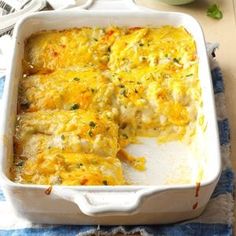 a casserole dish with chicken and cheese in it