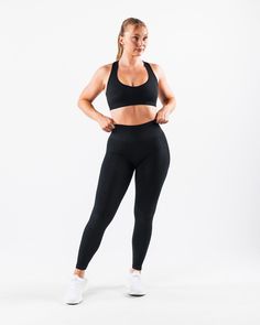 HIGHLIGHTS. High-waisted legging 3-tiered tapered waistband Seamless knit fabric No front seam Back scrunch seam detail to enhance curves New leg and glute contouring panels FIT SUGGESTION. This item runs true to Alphalete's standard seamless fit.. We recommend sizing up for a comfortable fit.. Model is 5’5”/167.6cm, wearing a size S with 39"/99cm hips and 28.5”/72.4cm waist. MATERIALS AND WASHING DIRECTIONS. 51% Polyamide, 38% Polyester, 11% Elastane. We recommend washing inside-out on a cold s Hip Hip, Ombre Effect, Womens Bras, High Waisted Leggings, Women's Leggings, Black Leggings, New Color, Knit Fabric, Knitted Fabric