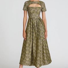 Metallic Jacquard Tea-Length Gown With Short Sleeves, Pockets, And Rounded Front Keyhole Neckline. Back Zipper Short Sleeves Pockets Front And Back Keyhole Tuck-Pleats At Waistline Tea Length Metallic Stretch Jacquard Lined Dry Clean 8816075 Https://Theiacouture.Com/Products/Theia-Natasha-Tea-Length-Gown-Gold Spring Wedding Jacquard Midi Dress, Elegant Jacquard Gown For Gala, Formal Gold Jacquard Dress, Green Jacquard Dress For Formal Occasions, Formal Green Jacquard Dress, Floor-length Jacquard Party Dress, Elegant Green Jacquard Dresses, Jacquard Floor-length Party Dress, Gold Jacquard Dresses For Wedding