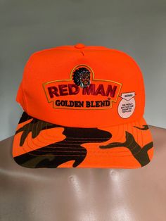 New & unworn Red Man Golden Blend Chewing Tobacco hunters snapback hat from the late 80's.  Neon orange USA made mesh hat, mint shape. OSFA. Red Retro 5-panel Hat, Retro Red 5-panel Hat, Retro Red Hats With Flat Bill, Retro Red Hat With Flat Bill, Retro Red Trucker Hat, Retro Baseball Cap Trucker Hat For Streetwear, Retro Snapback Cap, Retro Red Flat Bill Hat, Retro Snapback Hat