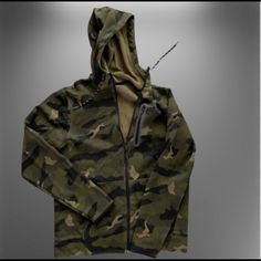 Size Small Old Navy Active Camouflage Jacket. Has Zipped Pouch And Pockets. Never Worn But Has Been Washed. Smoke Free Home Urban Camouflage Hooded Jacket For Streetwear, Camouflage Hooded Jacket With Adjustable Hood For Streetwear, Urban Camouflage Hoodie Outerwear, Sporty Long Sleeve Camouflage Outerwear, Camouflage Hoodie For Fall, Khaki Military Hoodie For Fall, Military Style Khaki Hoodie For Fall, Camouflage Military Hooded Long Sleeve Jacket, Casual Camouflage Hooded Jacket