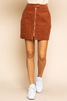 This corduroy mini skirt is a perfect match for a walk. Features high waist fit and an exposed front zipper with big patch pockets. High-Waisted Fit A-Line Short Length Button Closure Exposed Front Zipper Front Patch Pockets Back Welt Pockets Soft Corduroy Unlined 100% Cotton Hand Wash Cold, Lay Flat to Dry Imported Small: Length 17" Waist: 27" Medium: Length 17.5" Waist 29" Large: Length 18" Waist 31" . Corduroy Mini Skirt, Chic Skirts, A Line Shorts, Jumpsuits And Romper, Corduroy Skirt, Sewing Clothes, A Walk, Skirt Pants, Welt Pockets