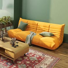 a living room with two couches and a coffee table on the rug in front of it