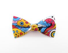 Make a statement with this bold and bright, Pop Art inspired bowtie. Complete the look with a complementing patterned faux pocket square. ✶✶ Bowtie Features ✶✶    ●  Handmade, pre-tied style bowtie     ●  Contains interfacing for maximum durability    ●  Fabric is custom printed by myself using sublimation    ●  Neck strap can be adjusted in length via the use of metal hardware. Colour of strap will be a complementing colour and not the same pattern as the bowtie.    ●  Four Sizes available: Playful Adjustable Bow For Summer, Adjustable Playful Bow For Summer, Spring Bow Tie As Gift, Elegant Spring Bow Tie For Gift, Elegant Spring Bow Tie As A Gift, Multicolor Bow Tie For Gift, Fitted Multicolor Bow Tie For Gift, Summer Gift Bow Standard Tie, Playful Summer Bow Gift