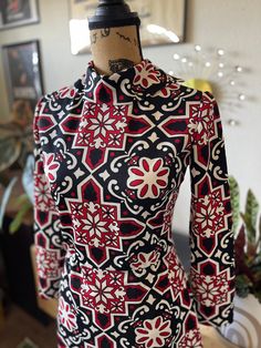 "Adorable vintage 1960s mod mini dress. Long sleeve and turtleneck. Dress has a geometric floral print in white, red, and black. In excellent vintage condition! Measurements  Chest 16\" Waist 13\" Length 36\" Follow our Instagram for reduced pricing on this dress and all of our other items listed! @vintage_envy_and_exotics FREE delivery or pick up in Bay Area (Oakland & SF)" Retro Long Sleeve Mini Dress For Fall, Fall Retro Long Sleeve Mini Dress, Vintage Long Sleeve Printed Dress, Spring Fitted Mini Dress With Bold Print, Spring Bold Print Fitted Mini Dress, Retro Long Sleeve Fitted Dress, Spring Mini Dress With Bold Print, Retro Fitted Long Sleeve Dresses, Chic Fitted Dress With Retro Print