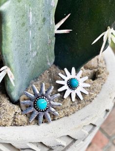 Faux Turquoise Add some western flair to your style with our Spur Earrings! These stud earrings feature tiny spurs (not meant for actual horse riding!) for a quirky and playful touch. Perfect for any cowgirl looking to add a unique accessory to their collection. Nickel-free Western Style Earrings, Nickel-free Adjustable Western Earrings, Adjustable Nickel-free Western Earrings, Western Turquoise Nickel-free Earrings, Turquoise Nickel-free Western Earrings, Western Style Turquoise Nickel-free Earrings, Western Style Nickel-free Turquoise Earrings, Western Style Earrings For Gifts, Adjustable Turquoise Concho Earrings