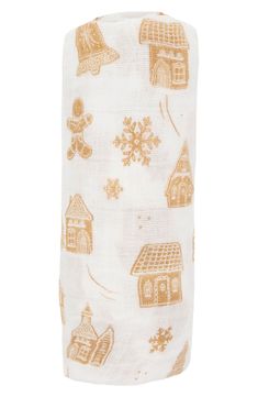 an oven mitt with gingerbread houses and snowflakes on it, sitting in front of a white background